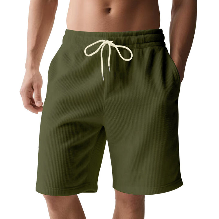 Men's knee-length Bermuda shorts with elastic waistband, drawstring, and side pockets StylebySassy