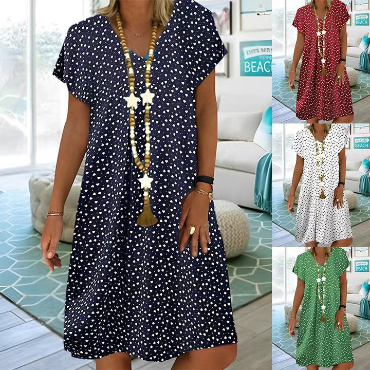 Ladies nan locker falling V-neck short dress with A-line cut, cap sleeves and all-over heart print StylebySassy