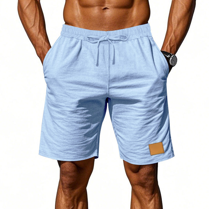 Men's drawstring Bermuda shorts made of soft cotton blend with elastic waistband and side pockets StylebySassy