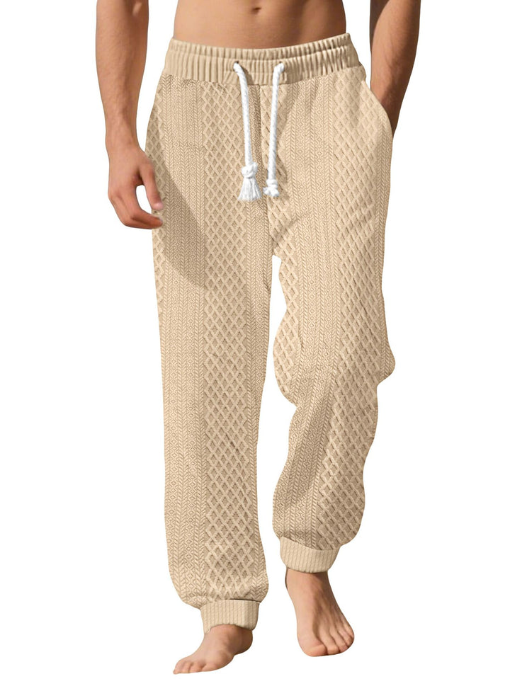 Men's knitted comfort pants with cable structure, elastic waistband, drawstring, and side pockets StylebySassy