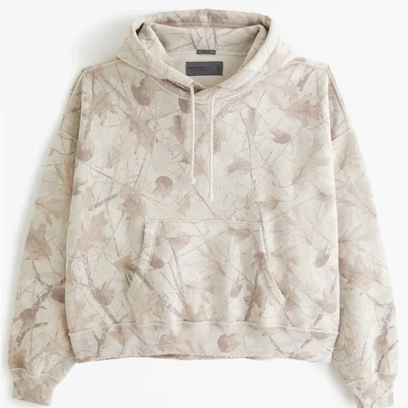Unisex loose-fit hoodie sweatshirt with subtle leaf texture, double hood without drawstring and kangaroo pocket StylebySassy