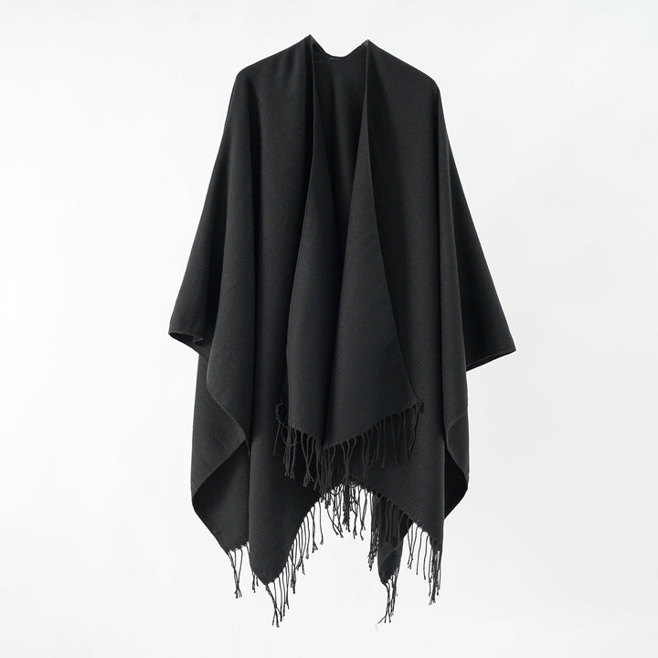Women's fashionable fringe poncho made of soft material with luxurious drape StylebySassy