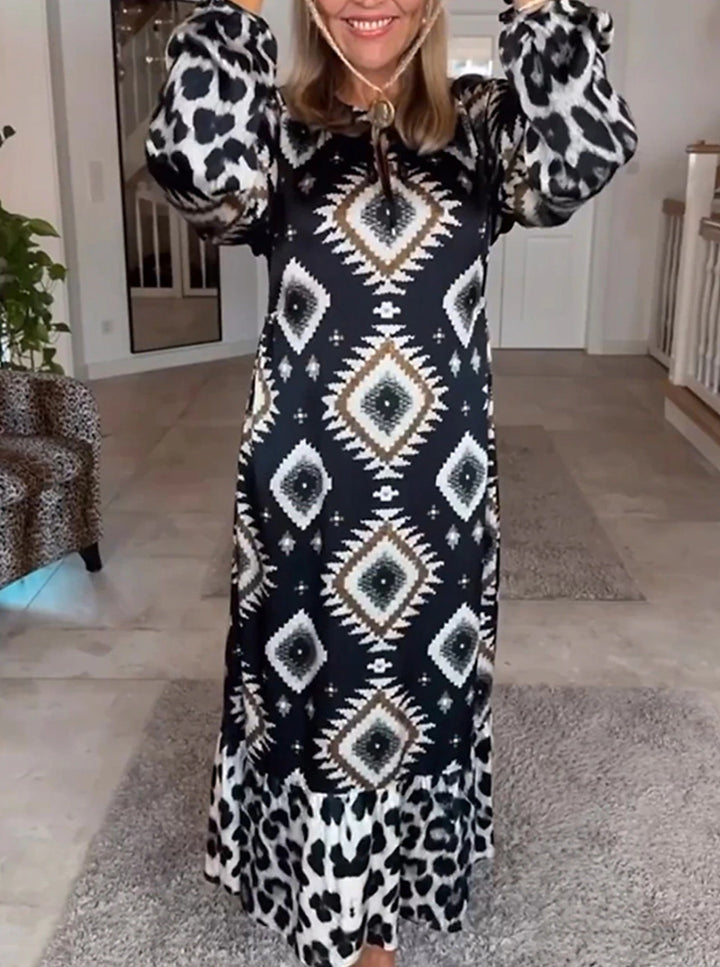 Women's flowing maxi dress with ethnic diamond print, keyhole neckline and contrast ruffle StylebySassy