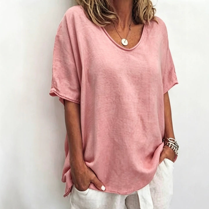 Women's loosely cut linen blend relaxed shirt with round neck, dropped sleeves and side slits StylebySassy