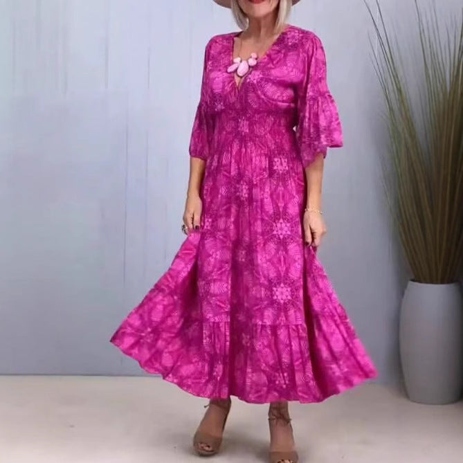 Women's airy midi dress with V-neck, tiered hem, and half-length ruffled sleeves StylebySassy
