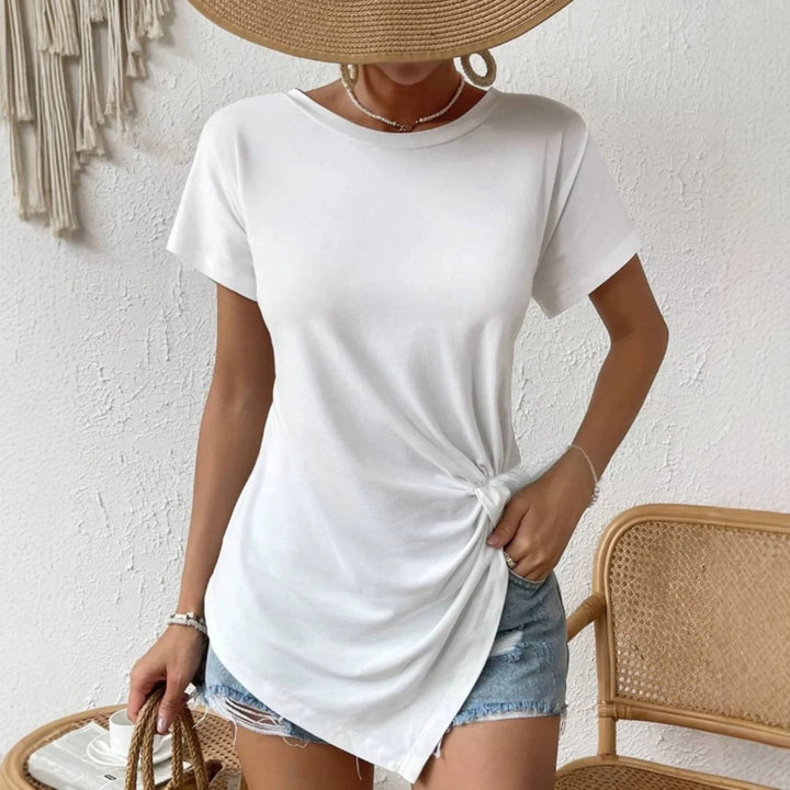 Women's asymmetrical knot shirt with side twist and elongated pointed hem StylebySassy
