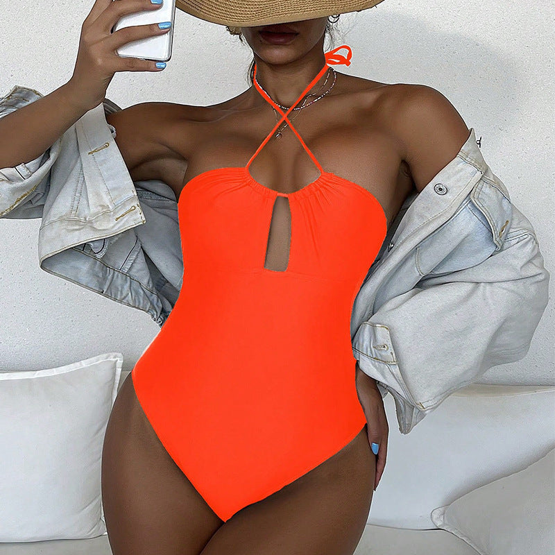 Women's one-piece swimsuit with adjustable lacing and modern cut-out details