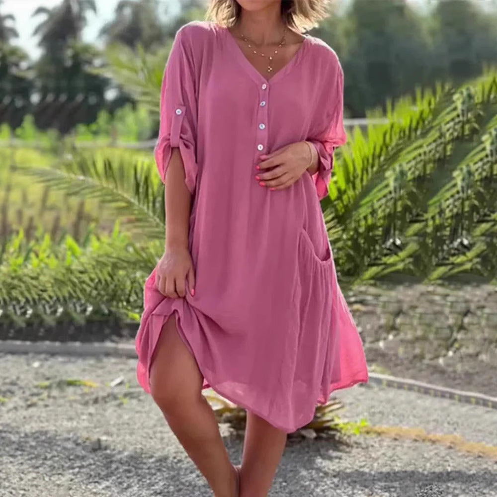 Women's lightweight V-neck beach dress with button placket, rolled sleeves, and patch side pockets StylebySassy