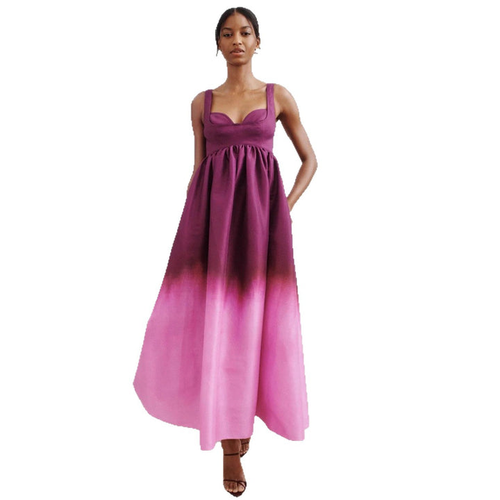 Women's floor-length bustier maxi dress with heart-shaped neckline, wide straps, and gathered empire waist StylebySassy