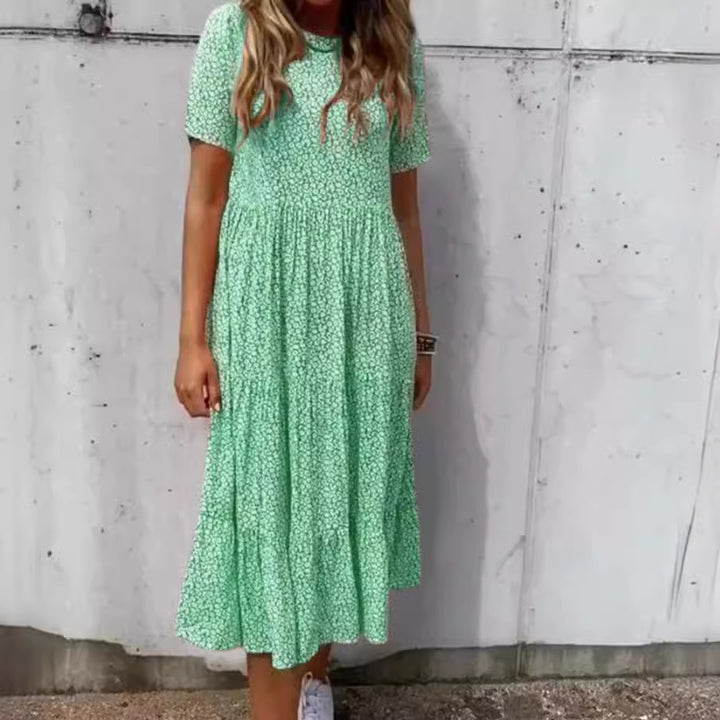 Women's light midi dress with gathered waist, short sleeves, and multilayered tiered skirt StylebySassy