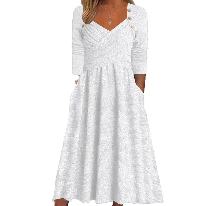 Women's knitted maxi dress with wrap top V-neck, side pockets and decorative button placket StylebySassy