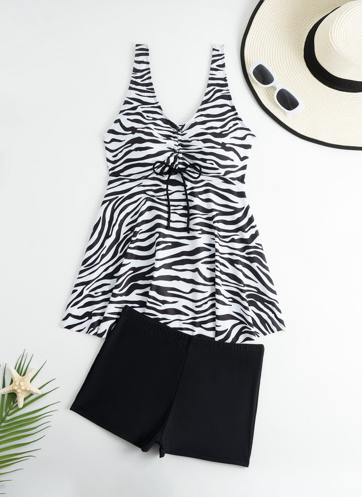 Ladies' tankini set with stylish ruffle and graphic peacock pattern StylebySassy