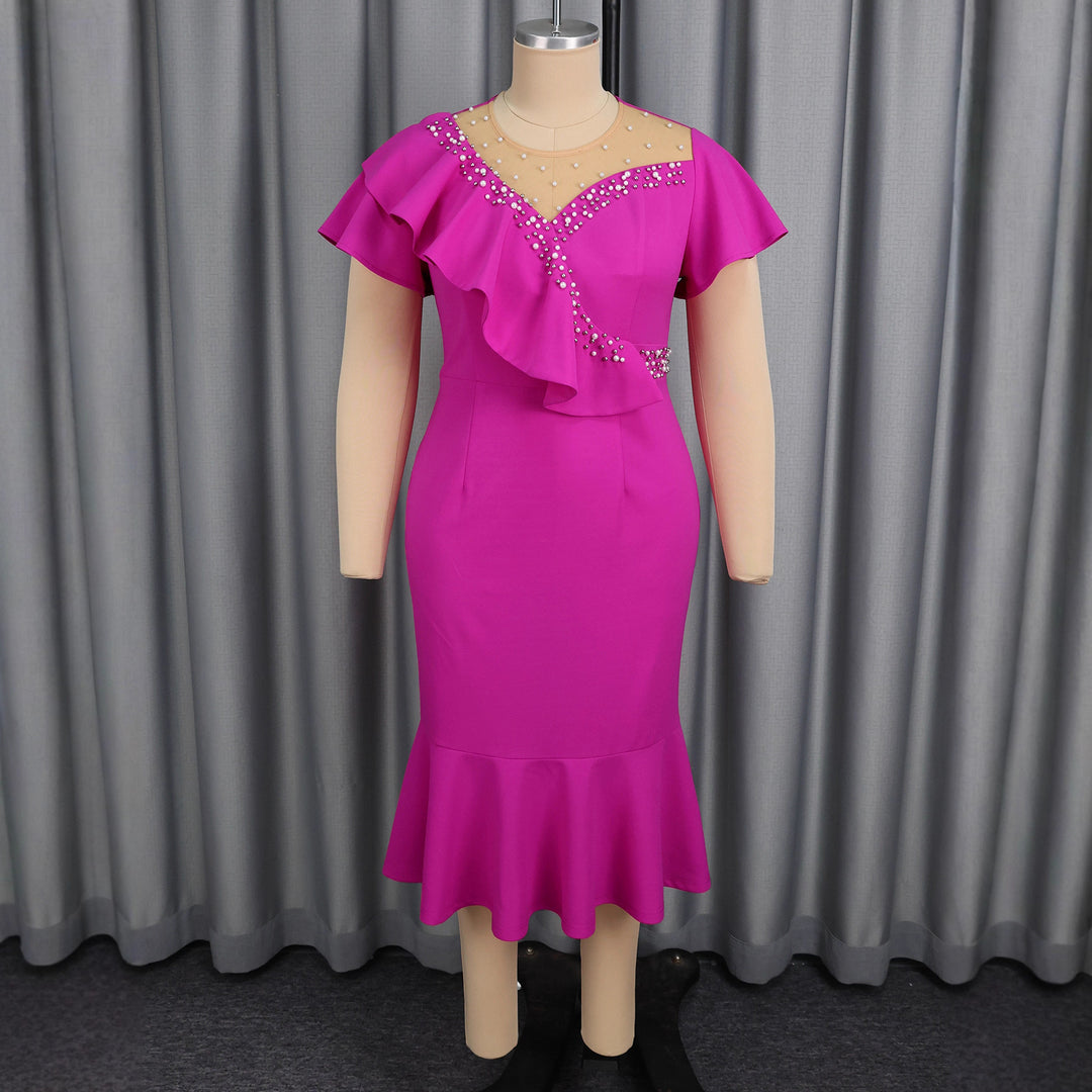 Women's figure-hugging dress with ruffle design and rhinestone accents StylebySassy