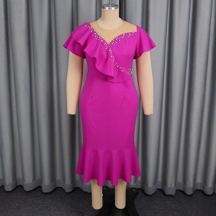 Women's figure-hugging dress with ruffle design and rhinestone accents StylebySassy
