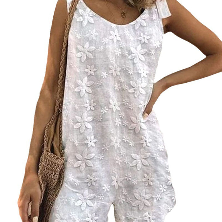 Women's lighter short overall with floral three-dimensional embroidery, adjustable tie straps and loose A-line silhouette StylebySassy