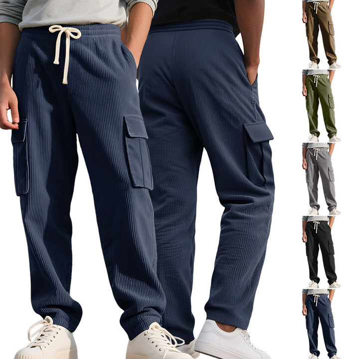 Men's casual utility cargo joggers with vertical ribbed structure, drawstring waistband, and large flap pockets StylebySassy