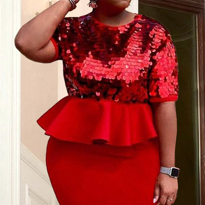 Ladies elegant glitter top with swinging peplum