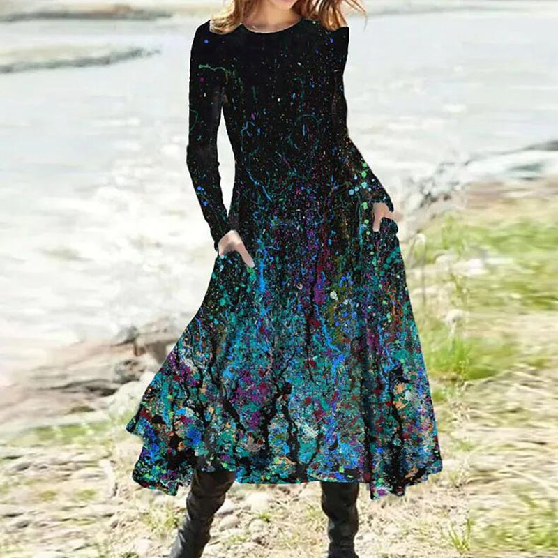Women's A-line midi dress with abstract spray pattern, round neckline, long sleeves and side pockets StylebySassy