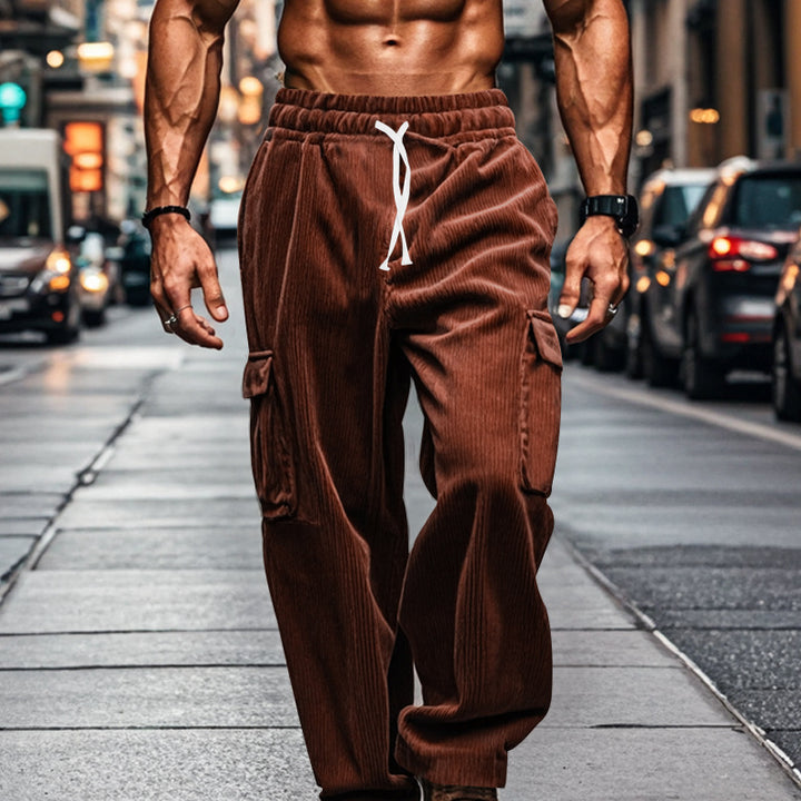 Men's oversized corduroy cargo pants with elastic drawstring waistband and multiple pockets StylebySassy