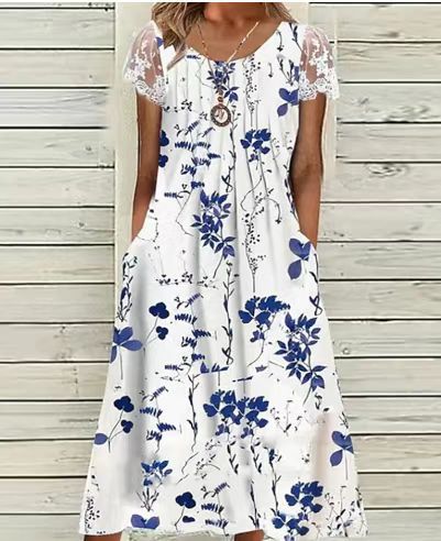 Ladies' airy A-line midi dress with lace sleeves, side pockets, and round neckline StylebySassy