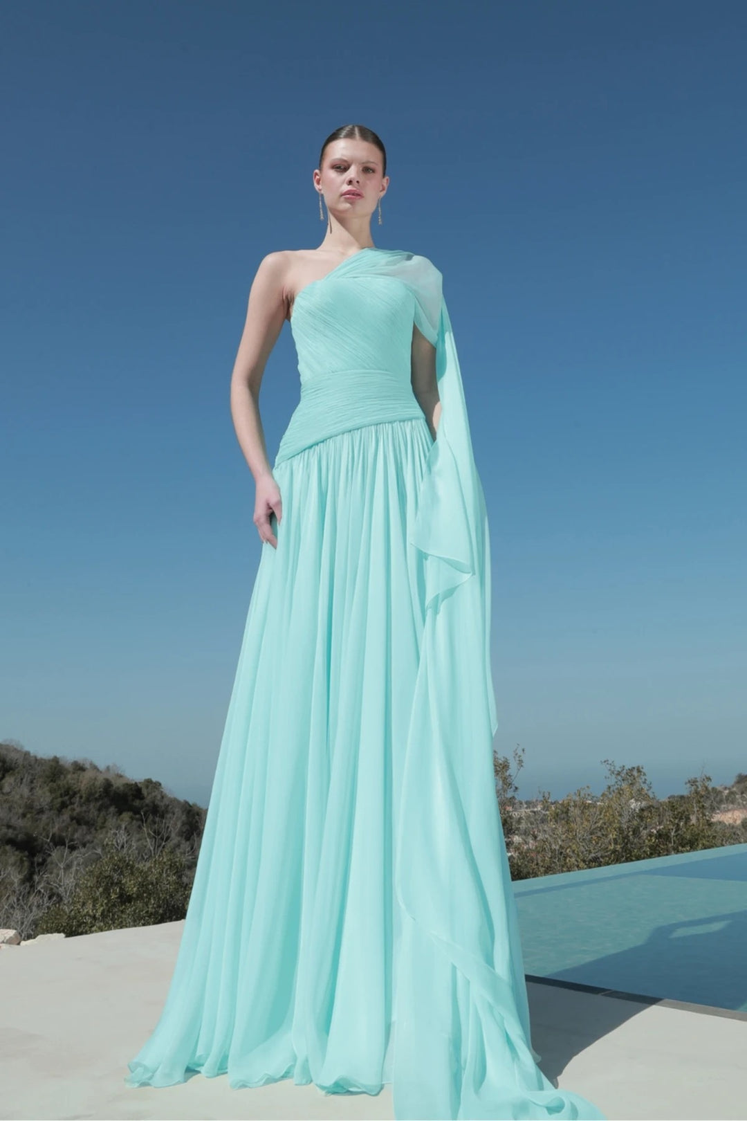 Women’s maxi dress with asymmetrical neckline and flowing fabric StylebySassy