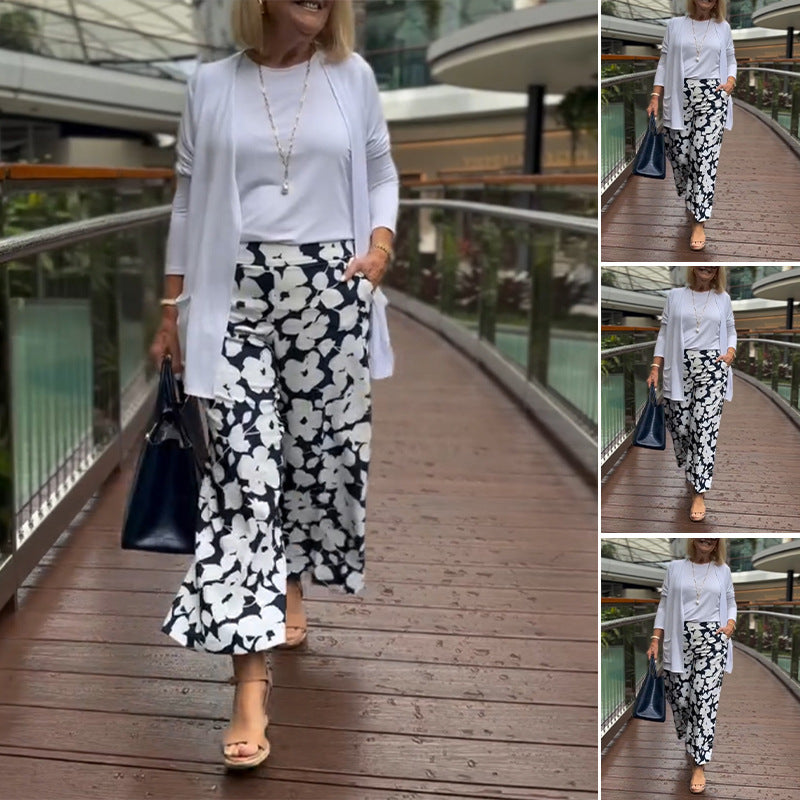 Women's wide Palazzo pants with large floral print, high waistband and side pockets StylebySassy