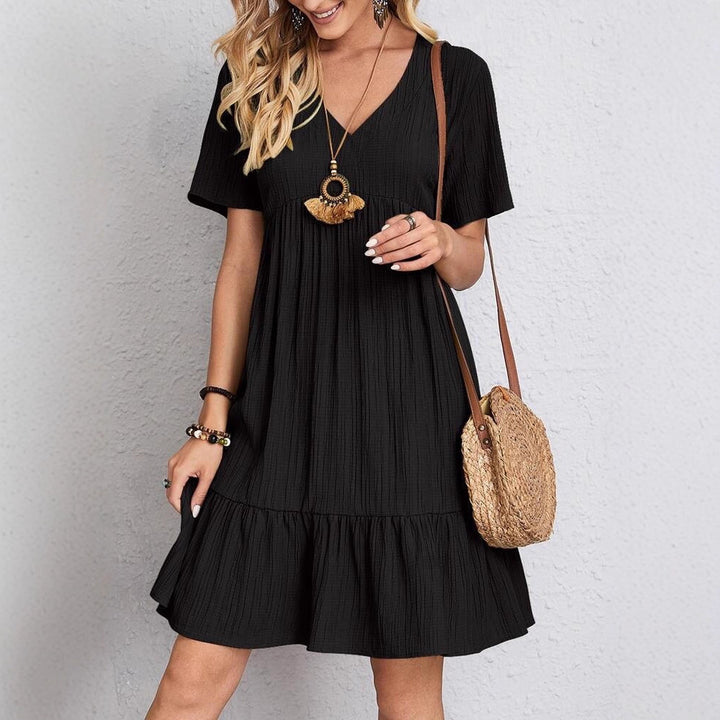 Women nan Crinkle summer dress with V-neck, empire seam and ruffle hem StylebySassy