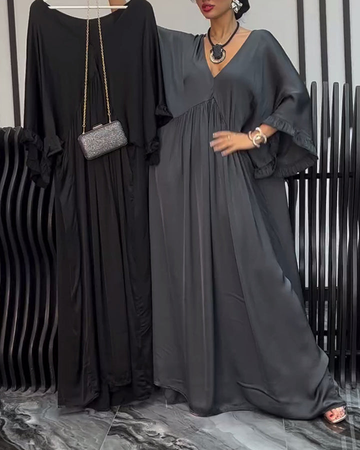 Women's satin look kaftan maxi dress with V-neck, gathered empire seam, and ruffled sleeves StylebySassy