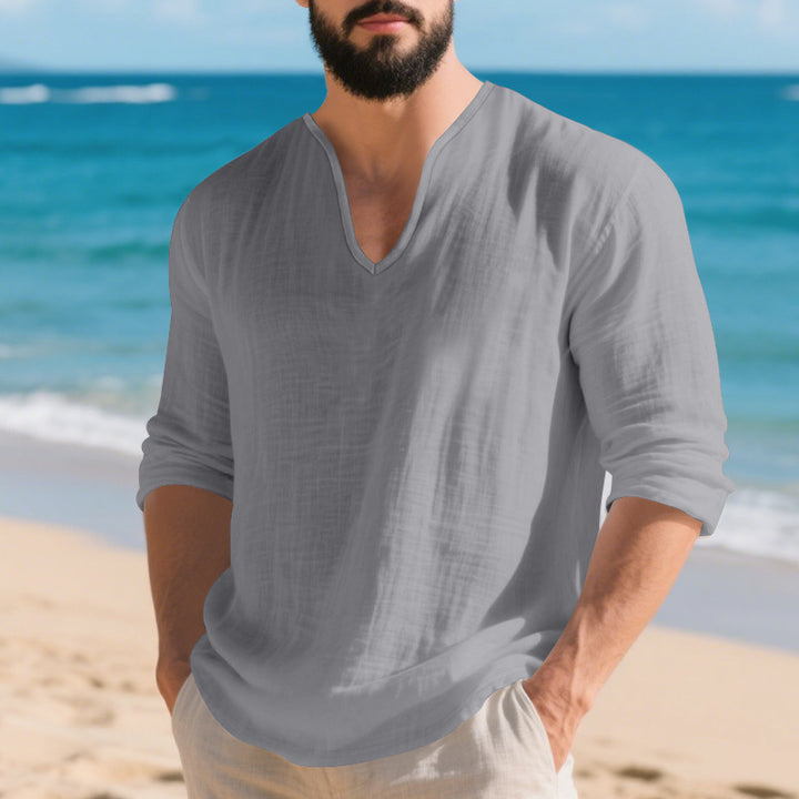 Men's lightweight linen V-neck shirt with a loose fit and roll-up sleeves StylebySassy