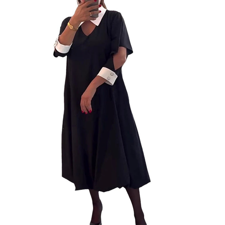 Women's casual midi dress with pointed contrast collar, cuffed sleeves, side pockets, and balloon hem StylebySassy