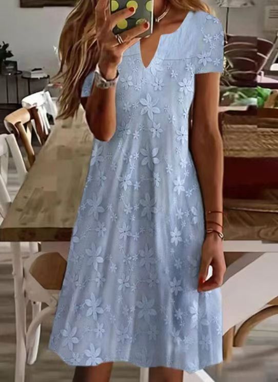 Women's knee-length A-line dress made of cotton blend with embroidered broderie overlay, short sleeves and V-neck StylebySassy