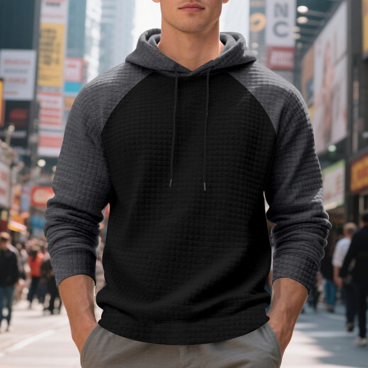 Men's quilted hoodie with raglan sleeves and drawstring StylebySassy