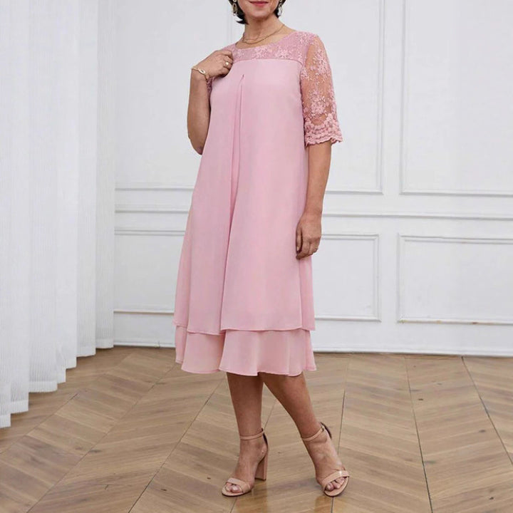 Women's A-line chiffon dress with floral embroidered lace yoke, hidden centre seam pleat, and layered ruffle StylebySassy