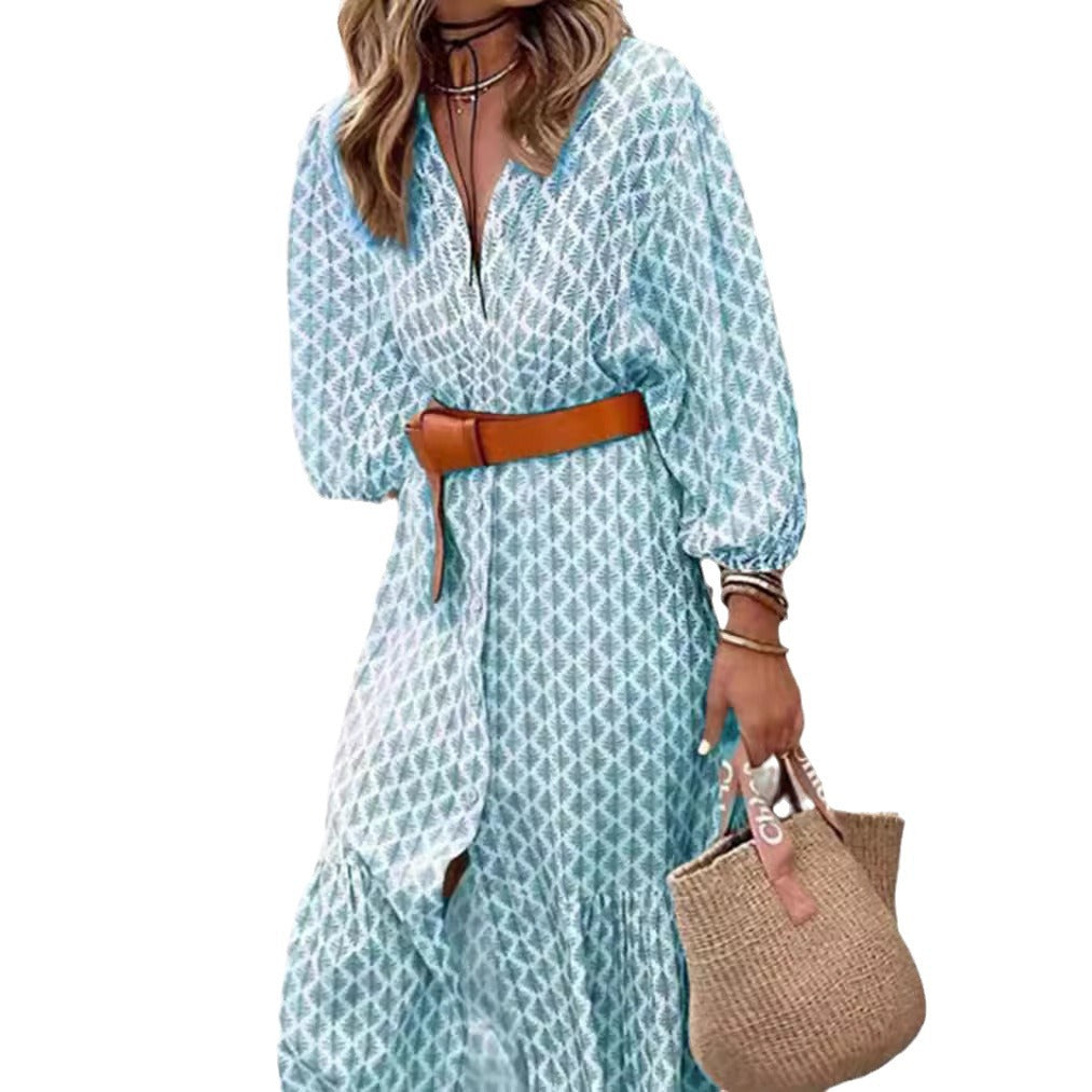 Women's lightweight patterned midi dress with V-neck, button placket, tiered skirt, and balloon sleeves StylebySassy