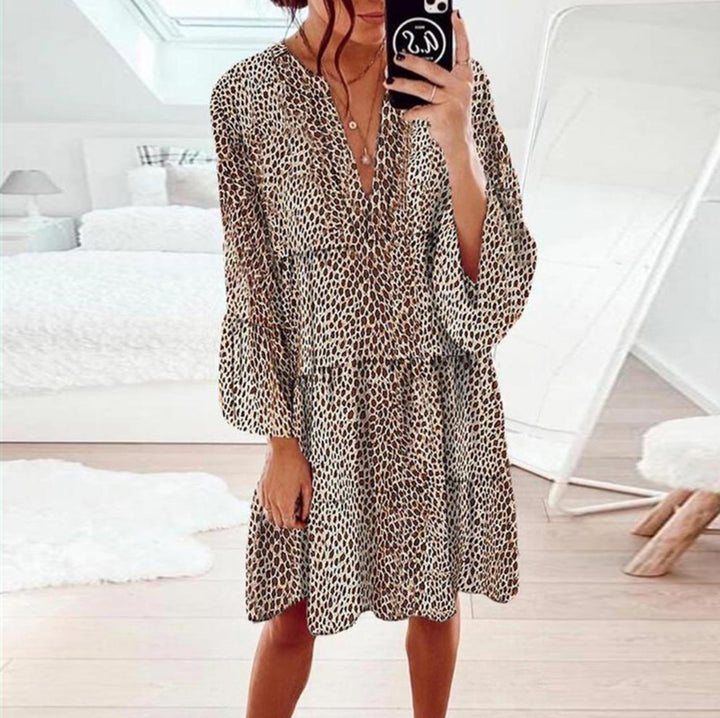 Women's cropped A-line tunic dress with deep V-neck, tiered skirt, and wide batwing sleeves StylebySassy