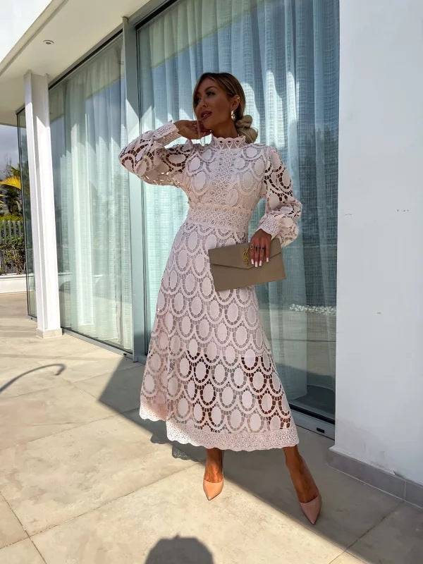 Women's crocheted midi dress with stand-up collar, transparent lace sleeves, and fitted A-line StylebySassy