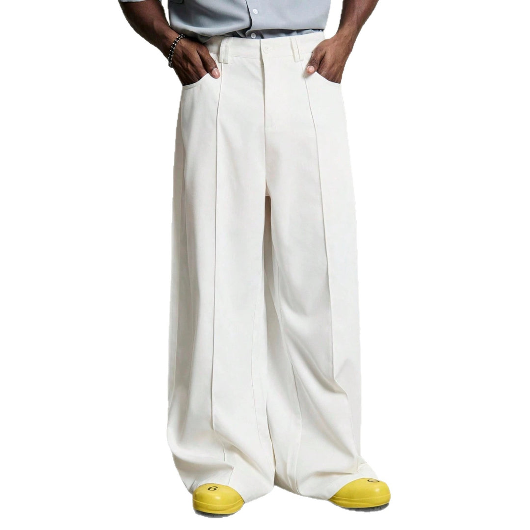 Men's wide pleated pants with high waistband, precise creases, and side inset pockets StylebySassy