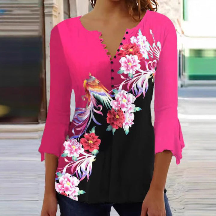Women's V-neck tunic blouse with floral bird pattern, three-quarter flounce sleeves and figure-flattering hem StylebySassy