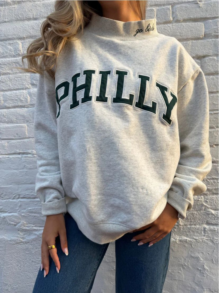 Women's oversized college sweatshirt with high stand-up collar and sewn-on lettering StylebySassy