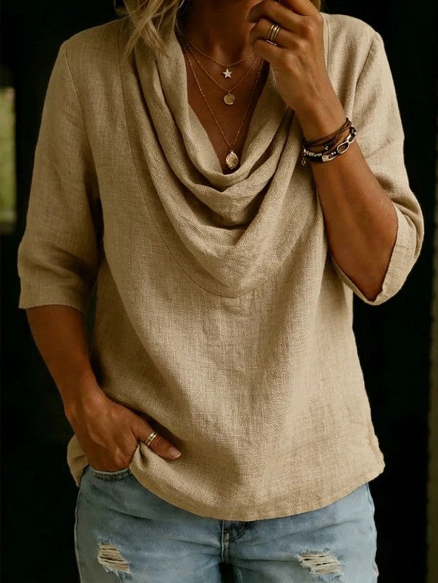 Women's airy linen blouse with draped waterfall collar, loose silhouette, and three-quarter sleeves StylebySassy