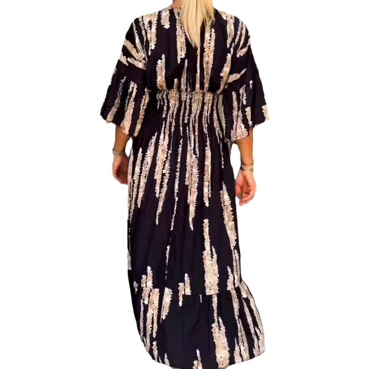 Ladies' V-neck maxi dress with brushstroke pattern, gathered underbust, balloon sleeves, and ruffled tiers StylebySassy
