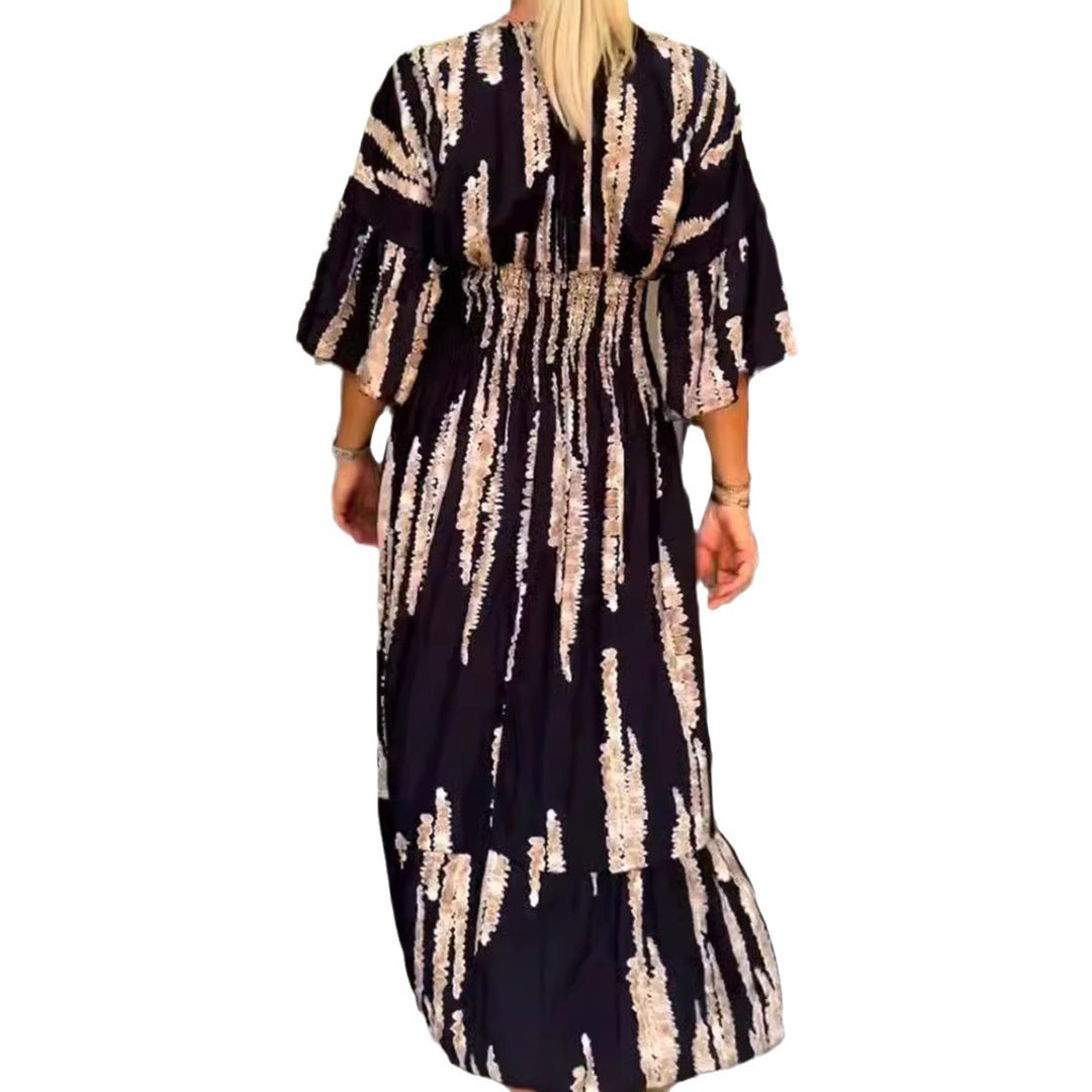 Women's maxi dress with V-neck, vertical brush print, gathered underbust seam and tiered ruffle skirt StylebySassy
