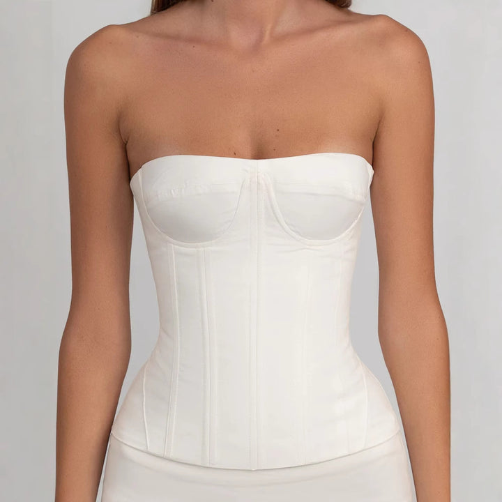 Women form-fitting corset dress with ruffled hem StylebySassy