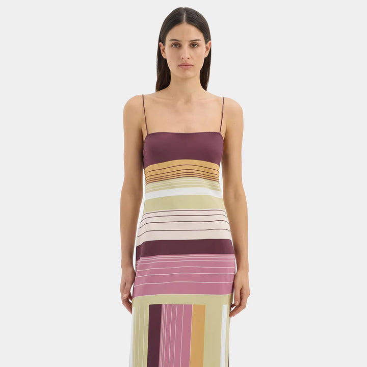 Women's figure-hugging maxi dress with spaghetti straps, straight neckline, panel stripes, and side slit StylebySassy