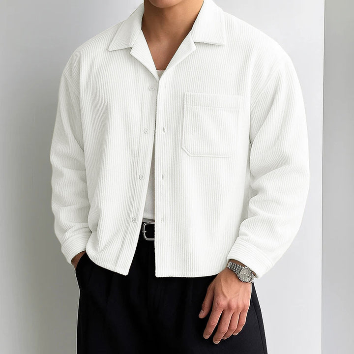 Men's ribbed long sleeve shirt with lapel collar, chest pocket, and relaxed fit StylebySassy
