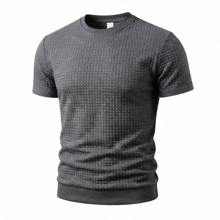 Men's short-sleeved knit shirt with embossed check structure, round neckline, and ribbed hem StylebySassy