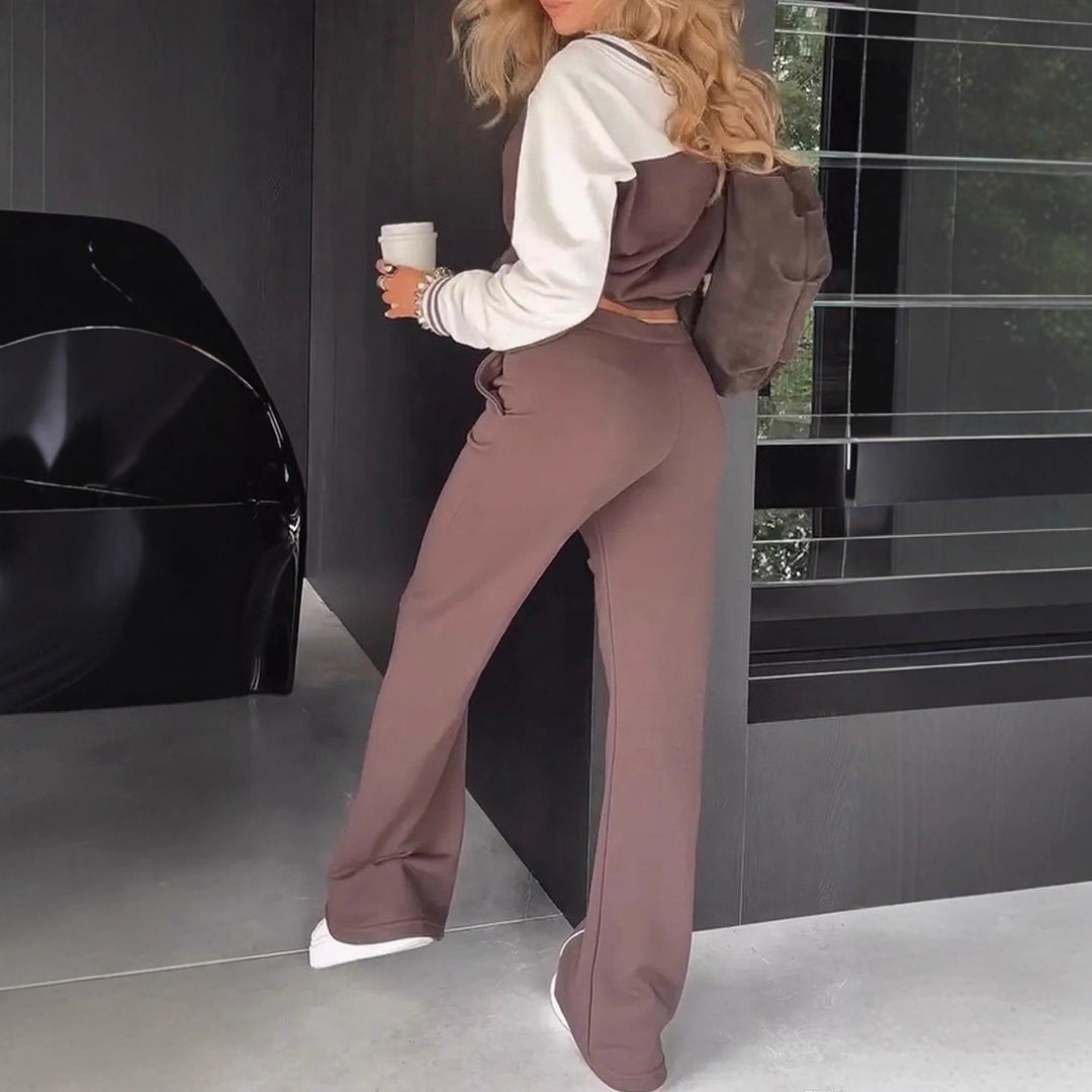 Women's sporty-elegant two-piece set made of cotton blend with V-neck sweatshirt and high-cut flared pants StylebySassy
