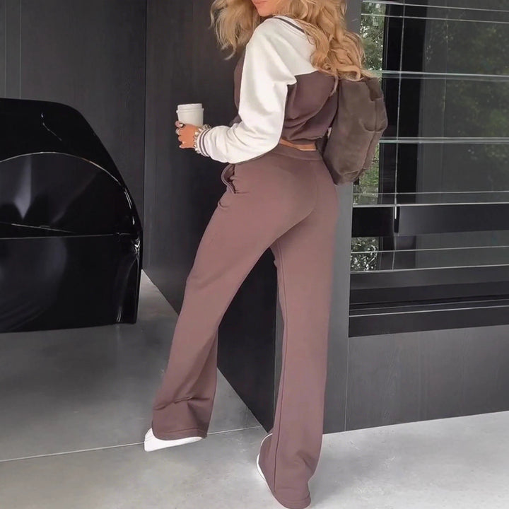 Women's sporty-elegant two-piece set made of cotton blend with V-neck sweatshirt and high-cut flared pants StylebySassy
