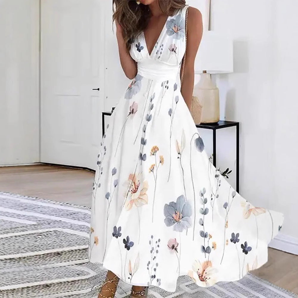 Women's flared midi dress with deep V-neck, empire waist and delicate floral print StylebySassy