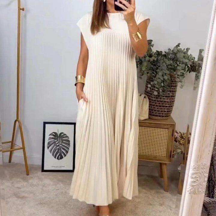 Women's flowing pleated maxi dress with dropped shoulders and side pockets StylebySassy